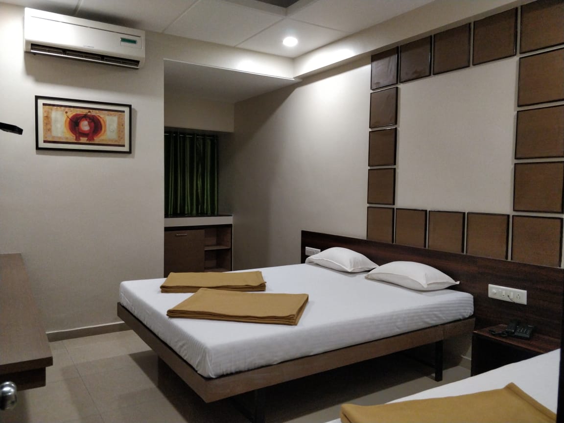 Hotel Raama Grand Lodging Kolhapur | 3 Bed AC